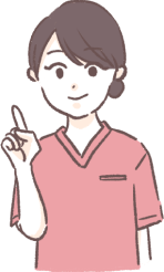 説明をする歯科助手